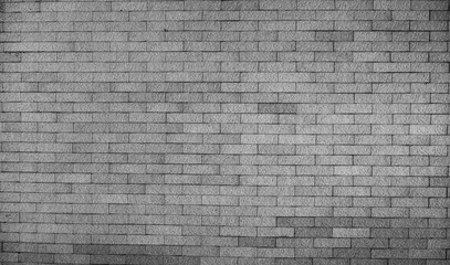 Dark brick wall texture background Masonry or stone flooring in the old style of stone. Black brick wall texture, brick texture for background, vintage dark gray bricks