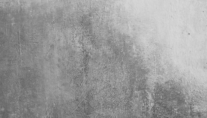 Fototapeta premium Beautiful gray abstract stucco wall background with cracks. Decorate Art Rough Stylized Texture Banner with space for text.