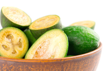 Juicy and ripe feijoa isolated on a white background. Healthy autumn fruit.
