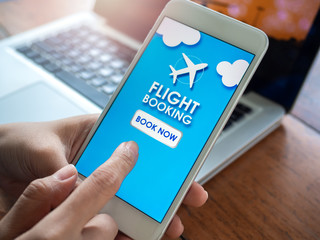 Flight booking online with smartphone.