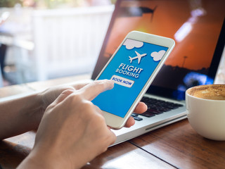 Flight booking online with smartphone.