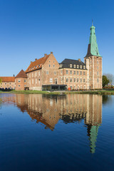 Fototapeta na wymiar Castle Raesfeld with reflection in the water in Germany