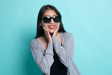 Portrait of a beautiful young asian girl in sunglasses.