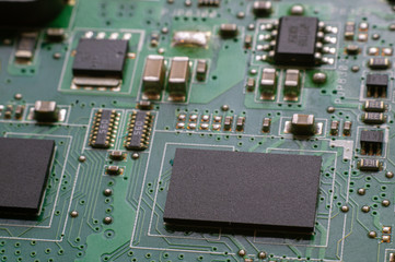 Transistors and circuit board tracks. Digital information