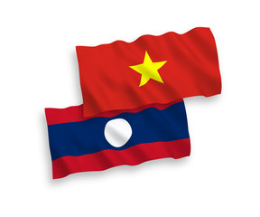 Fototapeta premium Flags of Laos and Vietnam on a white background