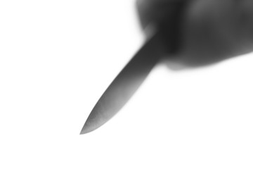 Point of a knife macro photo. Aggression. Murderer. Home violence.