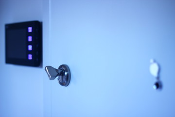 Door handle and key. Safety doors. Camera. Screen.