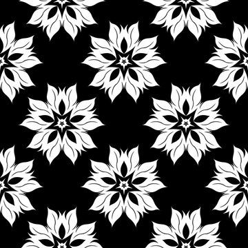 Black floral background with white seamless design