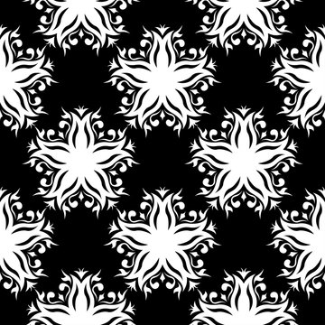 Black floral pattern on white seamless background