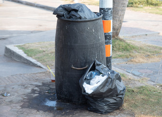 Street trash is full of unused plastic waste creating dirt and distractions for those who pass by.