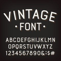 Vintage alphabet font. Damaged retro letters, numbers and symbols. Vector typescript for your typography design.