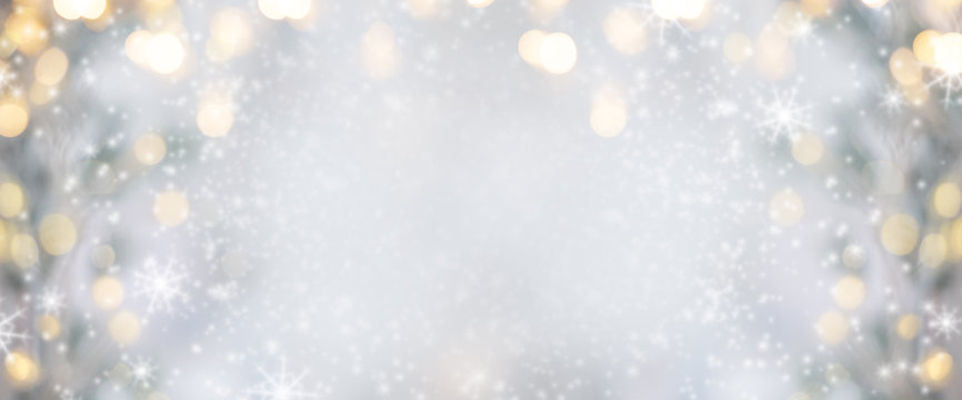 Christmas background. Xmas tree with snow decorated with garland lights, holiday festive background