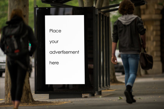Blank outdoor bus stop advertising shelter - Powered by Adobe