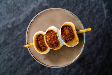Cooked Marshmallow Cocktail with Pretzel Sticks  also Called Sweet Baby or Babyccino.