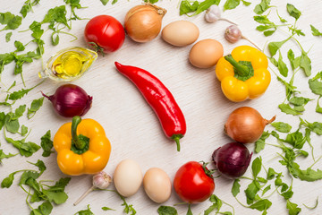 A set of vegetables for a healthy diet, yellow and red peppers, tomatoes, onions, garlic. .