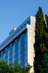Blue glass facade of a modern building