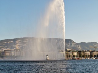 Geneva, Switzerland - October 18th 2019: a Beautiful autumn day in Lake Leman in Geneva. The Lake is surrounded by beautiful mountain that makes the sailing even more spectacular for the many sailors