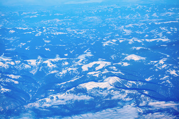 Fototapeta na wymiar aerial view of mountains covered by snow
