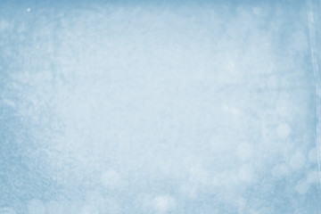 Abstract bokeh light sparkle on blue background