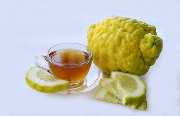 Bergamut flavored tea in cup on white background