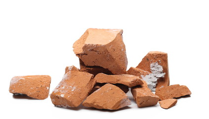 Shattered, broken bricks isolated on white background