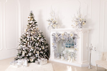 Beautiful Christmas Decorations On The White Fireplace