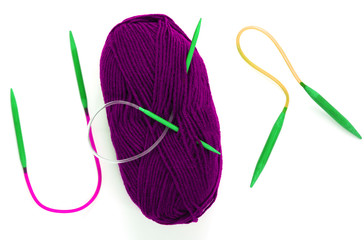 Purple yarn skein for hand knitting and crochet on white background isolated. Ball of bright violet...