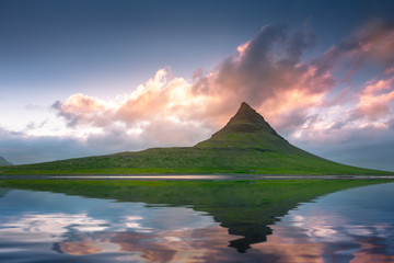 Beautiful clouds over the Kirkjufell mountain. Iceland