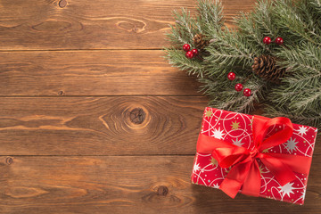 Gift box on wooden background	