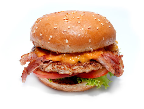 Juicy beef burger with bacon, cheese and salad.