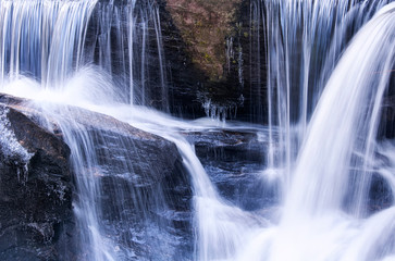 Fototapeta na wymiar Blurred winter waterfalls Enders falls State Park