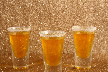 Glasses with a yellow cocktail