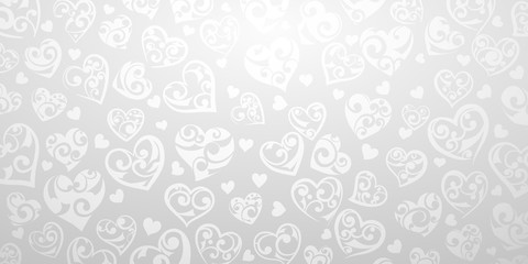 Background of big and small hearts with ornament of curls, in gray and white colors