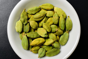 close up of cardamom on dark background, top view  © picsmart