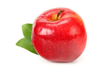one red apple with green leaves isolated on white background