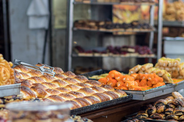 Yeast dough cookies stuffed with cheese. Blurred background. kosher food.