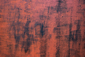 Rusty metal painted texture background. Orange.