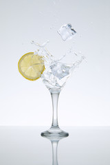 Glass of alcoholic drink with ice