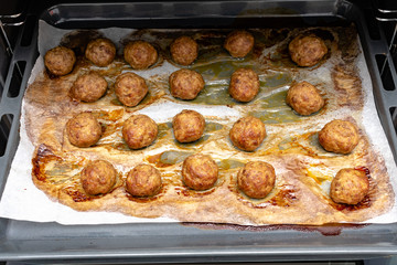 Delicious rustic roasted meatballs with carrot and onion