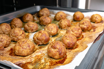 Delicious rustic roasted meatballs with carrot and onion