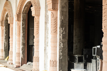 decorated columns and arches in the Indian temple under construction.