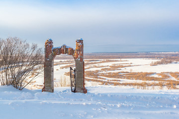 View of the gates and Oka in the Nizhny Novgorod region in winter