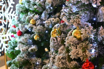 beautiful light and ball ornament decoration on christmas tree