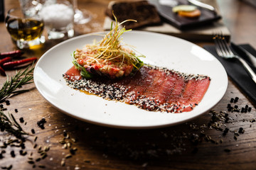 Tuna sashimi served on a plate in restaurant