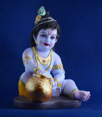 Hindu God Krishna on blue background