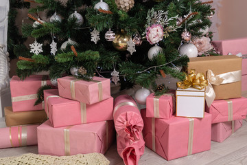 Many different gifts under the Christmas tree