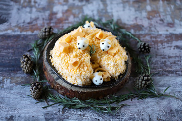 Salad symbol of the new year 2020 white rat. Mice in a cheese salad. Christmas dish.