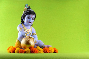 Hindu God Krishna on green background