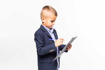 School boy in suit show blank sheet clipboard isolated on white background