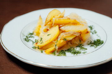Fried potatoes with onions